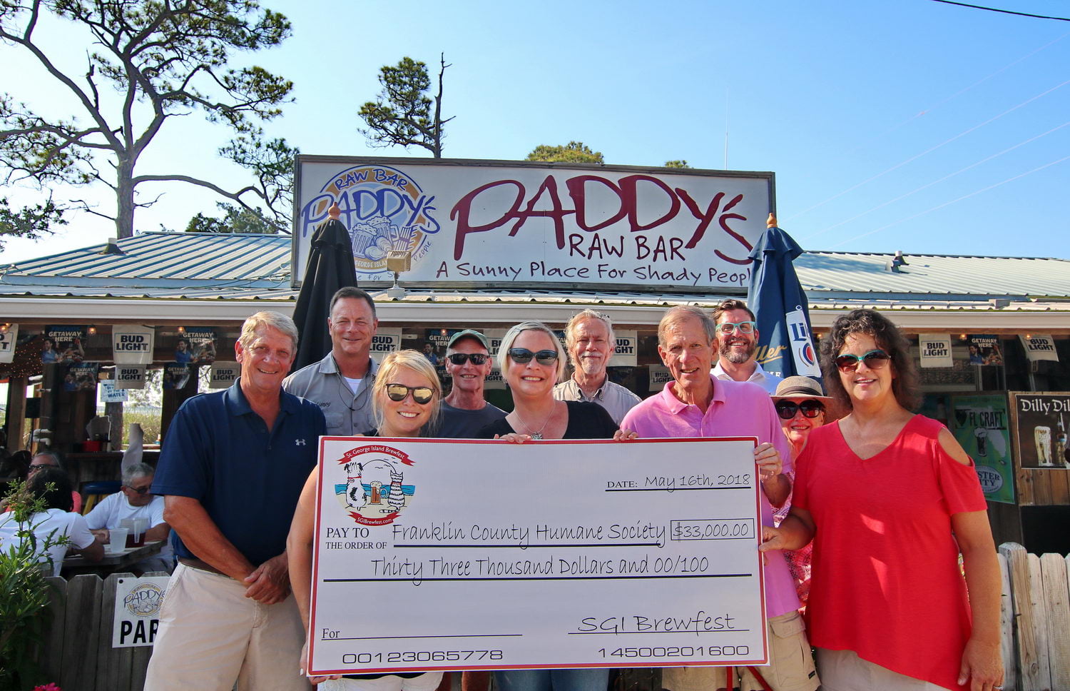SGI Brewfest commitee presents check to Humane Society